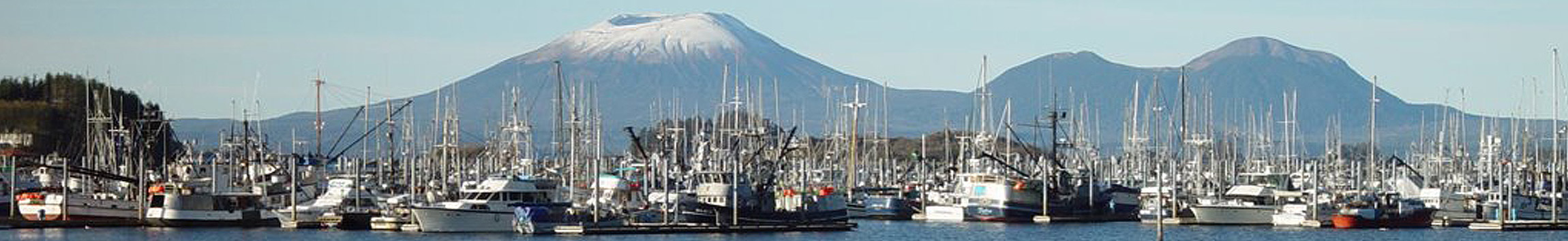 Mount Edgecumbe stands over a harbor in Sitka, Alaska